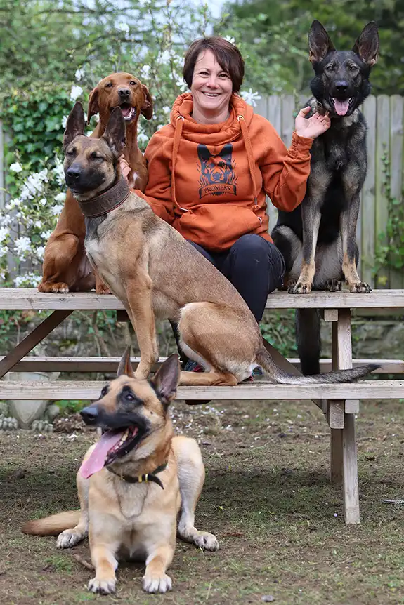 cheryl blake frome k9 instructor with her four dogs